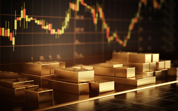 a stack of gold bars next to a stock chart on a wall
